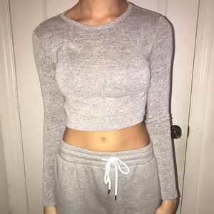 grey long sleeved top